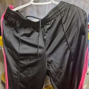 Women adidas never used!!! Black and Pink Track Pants